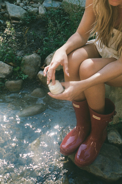 
Using Follicular / Ovulatory Balm beside a creek