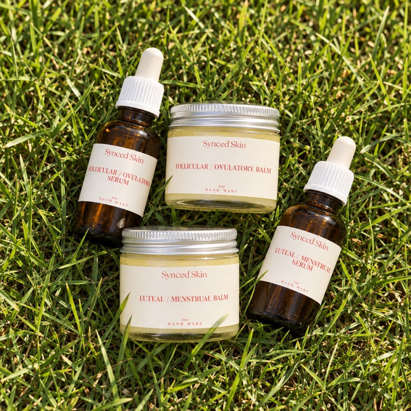 All four Full Size Synced Skin formulas arranged on grass.