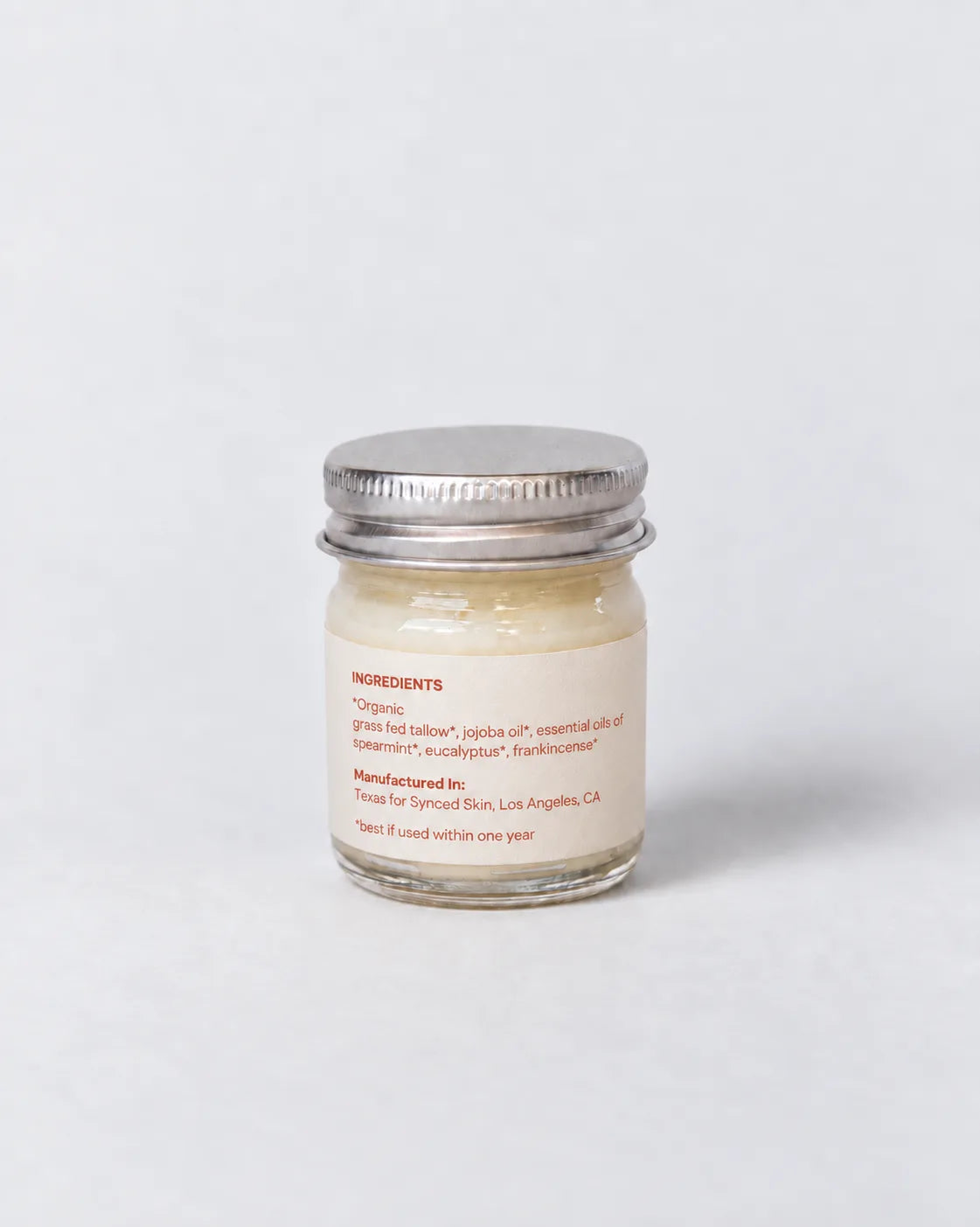 Illustrative rendering of the Mini Luteal / Menstrual Balm back label; not a photograph of physical packaging